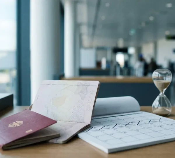 Stressed traveler checking calendar and passport at European border control desk with clock showing deadline approaching